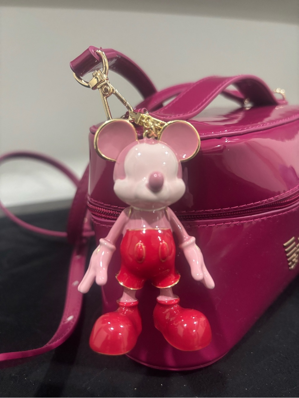 BaubleBar Pink and Red Enamel Mickey-Style Bag Charm
